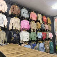 فروشنده لباس بچه گانه