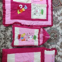 رختخواب نوزاد همراه بالش شیردهی