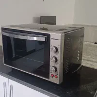 توستر گوسونیک ۶۰ لیتری و گلیم فرش