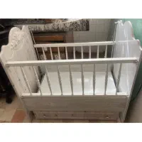 تخت کنار مادر کودک