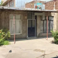 خانه ویلایی با دو باب مغازه