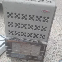 بخاری کپسولی و یک عدد گاز دوشعله رومیزی