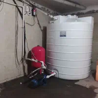 لوله کشی آب نصب پمپ ساختمان تعمیرات پکیج