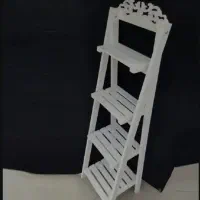 استند گل و مجسمه و گلدان