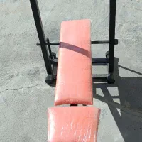 میز پرس و هالتر و وزنه و دمبل