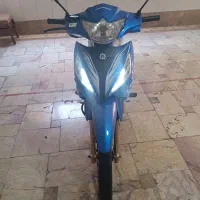 موتورسیکلت طرح تی وی اس زمرد