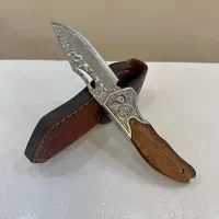 چاقو تاشو اصلی کنده کاری شده با قلاف چرم گاومیش|کلکسیون اشیاء عتیقه|کرج, ساسانی (قلمستان)|دیوار