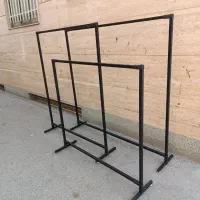 رگال لباس|بندرخت و رختآویز|قدس, شهرقدس|دیوار