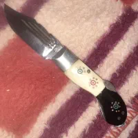 یک چاقوی دسته استخان