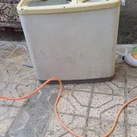 ماشین لباس شویی سینجر