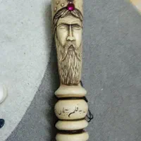 عصای کندکاری شده شاهان روی استخوان شتر