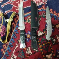 دو عدد چاقو و یک عدد تیرکمان سنگی