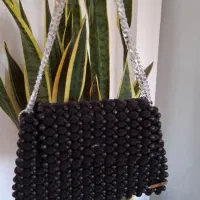 کیف مرواریدی|کیف، کفش، کمربند|رشت, امین الضرب|دیوار