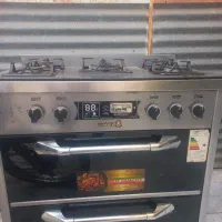 یک عدد اجاق گاز به همراه بخاری