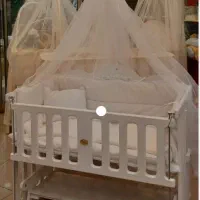 تخت گهواره ای نوزاد