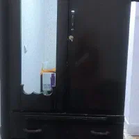 کمد لباس قهوه ای کشودار