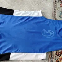 لباس وکفش کشتی