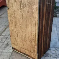 تعدادی وسایل صندلی و بخاری
