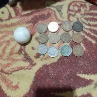 سکه 50ریالی دهه 60و50ویکعدد سنگ الماس آسیاب