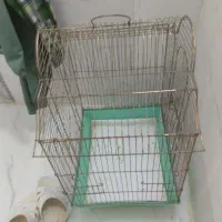 یک عدد قفس پرنده و عروس هلندی