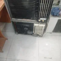 کولر گازی جلو پنجره‌ای