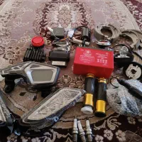 تعدادی لوازم موتور سیکلت کلیک ،200،250فروشی