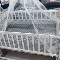 تخت کنار مادر