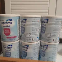 تعدادی قوطی شیر خشک پپتی