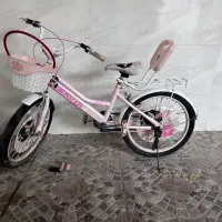 دوچرخه دخترانه سایز ۲۰ به همراه یه جفت کمکی|دوچرخه، اسکیت، اسکوتر|میانه, |دیوار