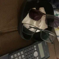 عینک و ماشین حساب کاسیو casio