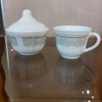 ۶ عدد فنجان و نعلبکی و قندان برند پارس اوپال