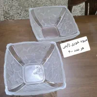 تعدادی ظرف و ظروف|ظروف سرو و پذیرایی|رباط‌کریم, رباط‌کریم|دیوار