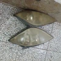 یک جفت چراغ جلوی تیبا