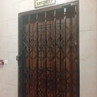 درب حفاظ آکاردئونی ونرده