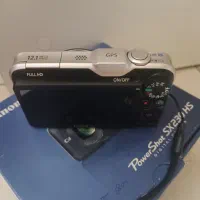 دوربین canon و پایه دوربین در حد نو