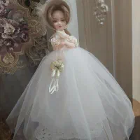 عروسک دست ساز نصب رو استند چوبی