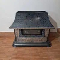 بخاری گازی طرح شومینه