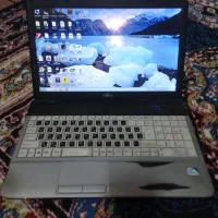 لپ تاپ فوجیتسو ویندوز ۷ رام ۴ گیگ درحد نو کم کار