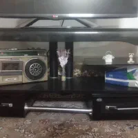 میز تلویزیون شیشه ای شیشه ها همه سالم