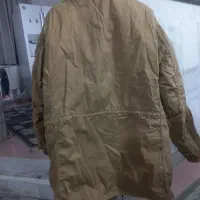 کاپشن|لباس|نیشابور, گنبد سبز|دیوار