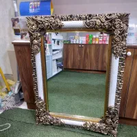 اینه با قاب زیبا