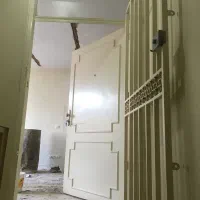 درب چوبی با حفاظ اهنی