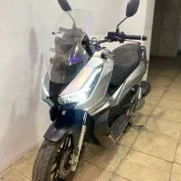 adv همتاز