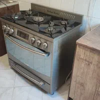 اجاق گاز فر دار صفحه شیشه‌ای تکنو هاوس