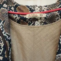 کاپشن|لباس|قم, انسجام|دیوار