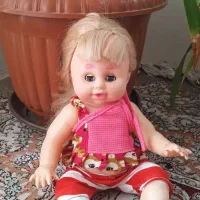 عروسک|اسباب‌بازی بچه|گلبهار, شهر جدید گلبهار|دیوار