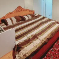 تخت خواب چوب دو نفره