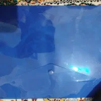 یک عدد پوشه  دکمه دار