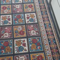 مقداری گلیم وکناره وموکت