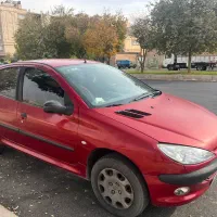 206 آلبالویی مدل 90|خودرو سواری و وانت|شیراز, قالیشویی|دیوار